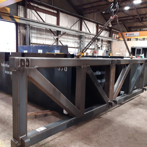 Steel fabrication frame in a workshop