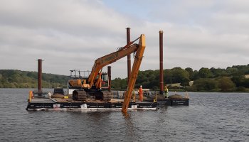 Pontoon being used for reservoir maintenance