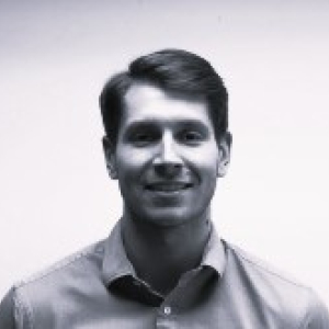 Head shot of James Abdous in black and white