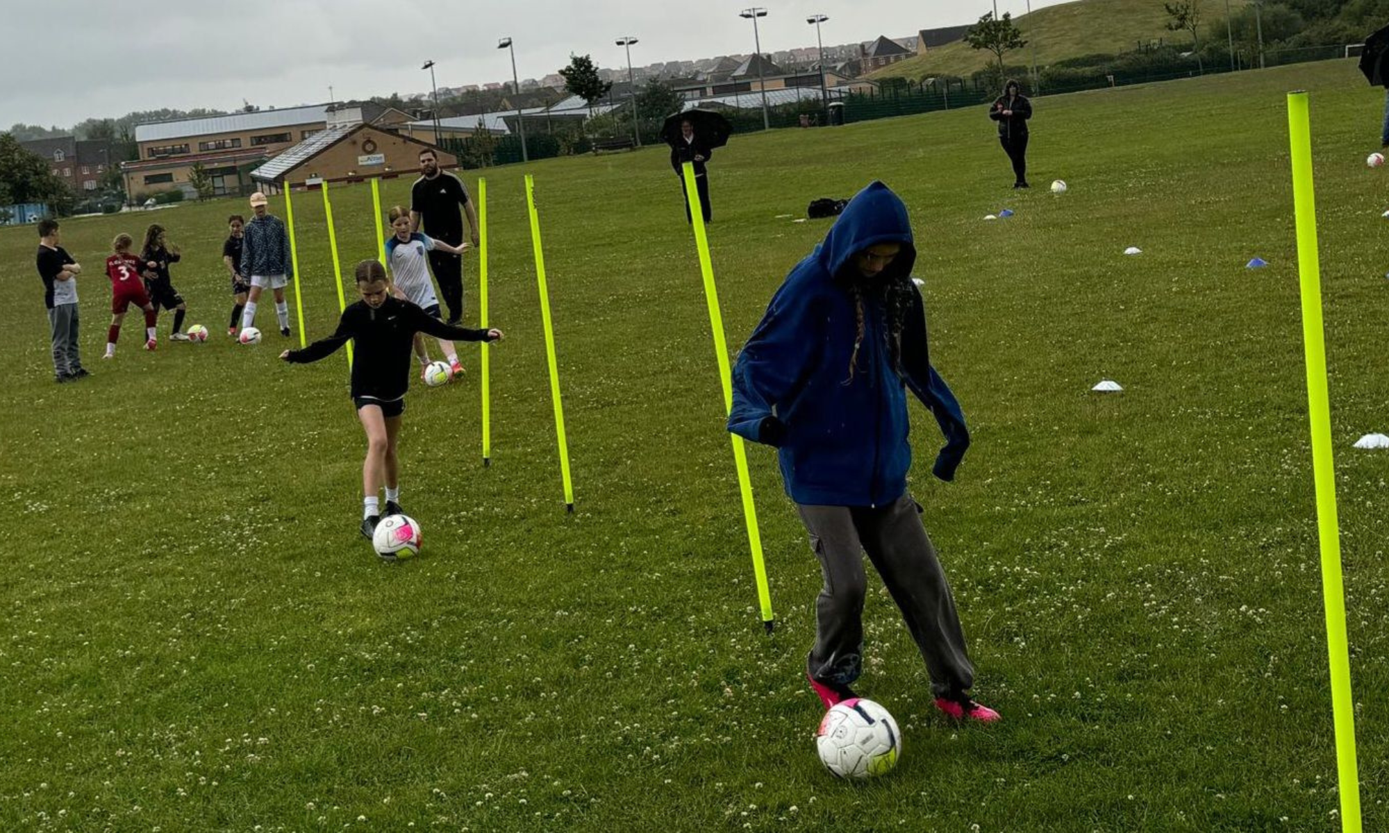 Children playing football.