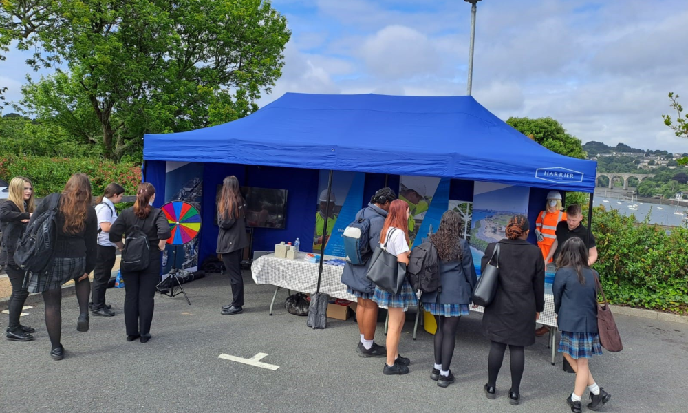 Children at a STEM event outside a VolkerStevin stand.